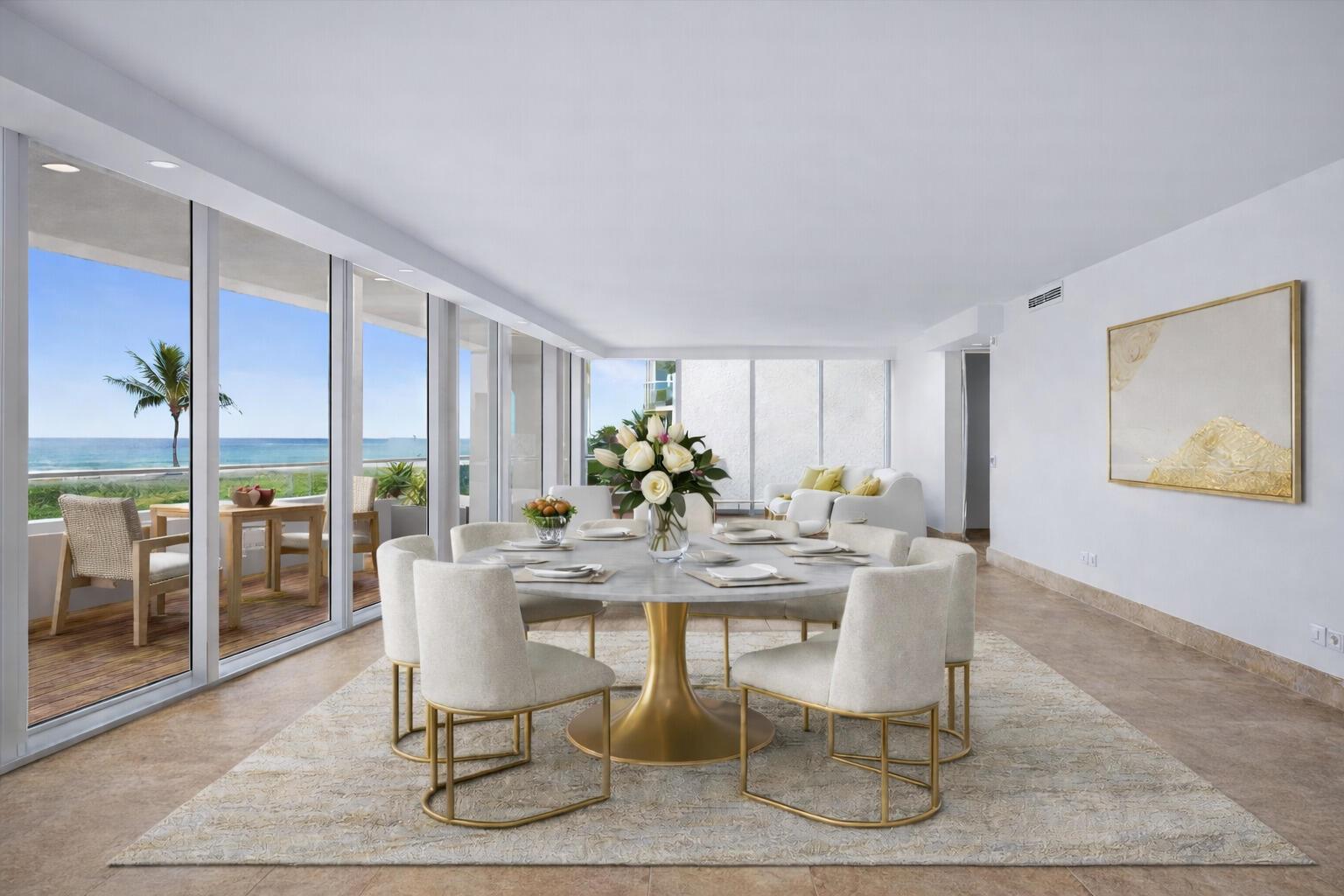A dining room with a round marble table, gold base, and ocean view balcony — 2800 S Ocean Boulevard Unit 2f, Boca Raton FL 33432, BOCA RATON, FL