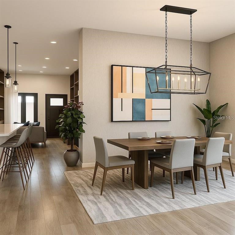 This is a rendering of a modern dining room featuring a wooden table and chandelier — 4254 ENID LANE, NORTH PORT, FL