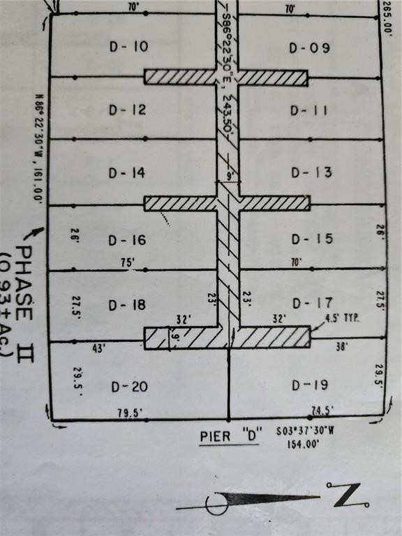This is a site plan map showing the layout of boat slips labeled D-09 through D-20 — 2800 HARBOURSIDE DRIVE UNIT D-16, LONGBOAT KEY, FL