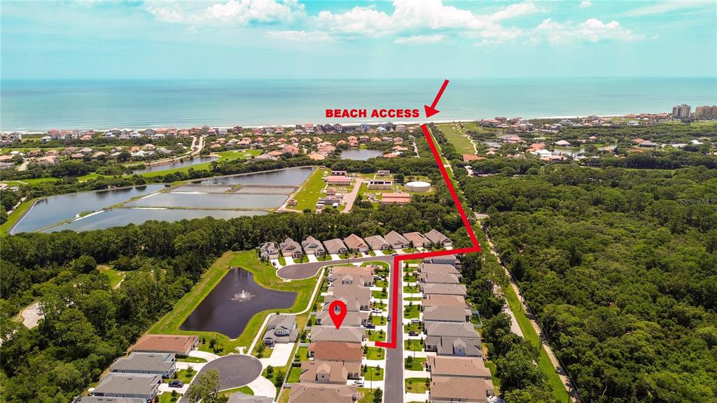 An aerial view shows a residential neighborhood with a red path indicating beach access — 40 MOANA COURT S, PALM COAST, FL