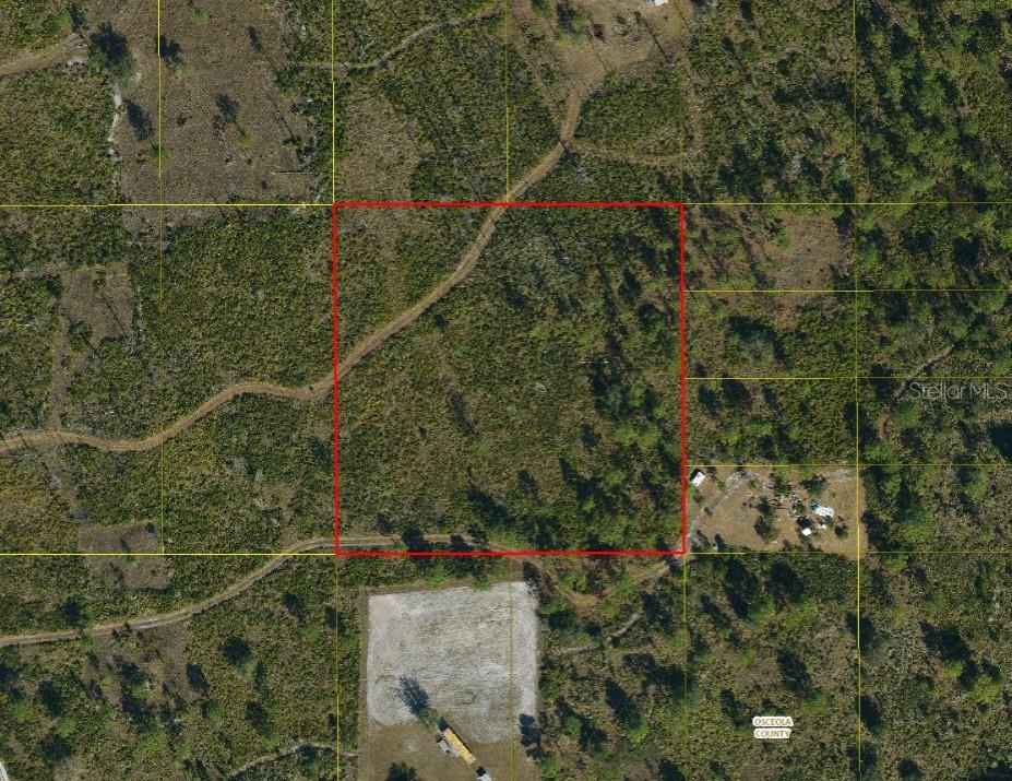 An aerial map view shows a rectangular plot of land outlined in red — SUBURBAN ESTS SEC 35...4442 002J, ST CLOUD, FL