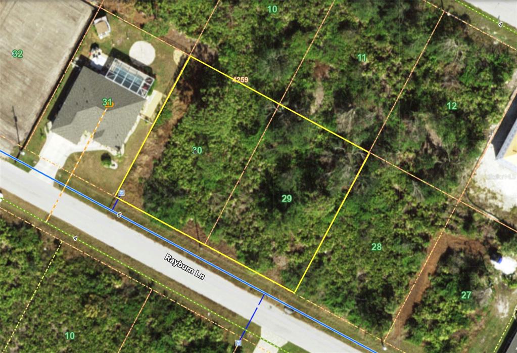 This is an aerial map showing a vacant residential lot outlined in yellow on Rayburn Lane — 13396 RAYBURN LANE, PORT CHARLOTTE, FL