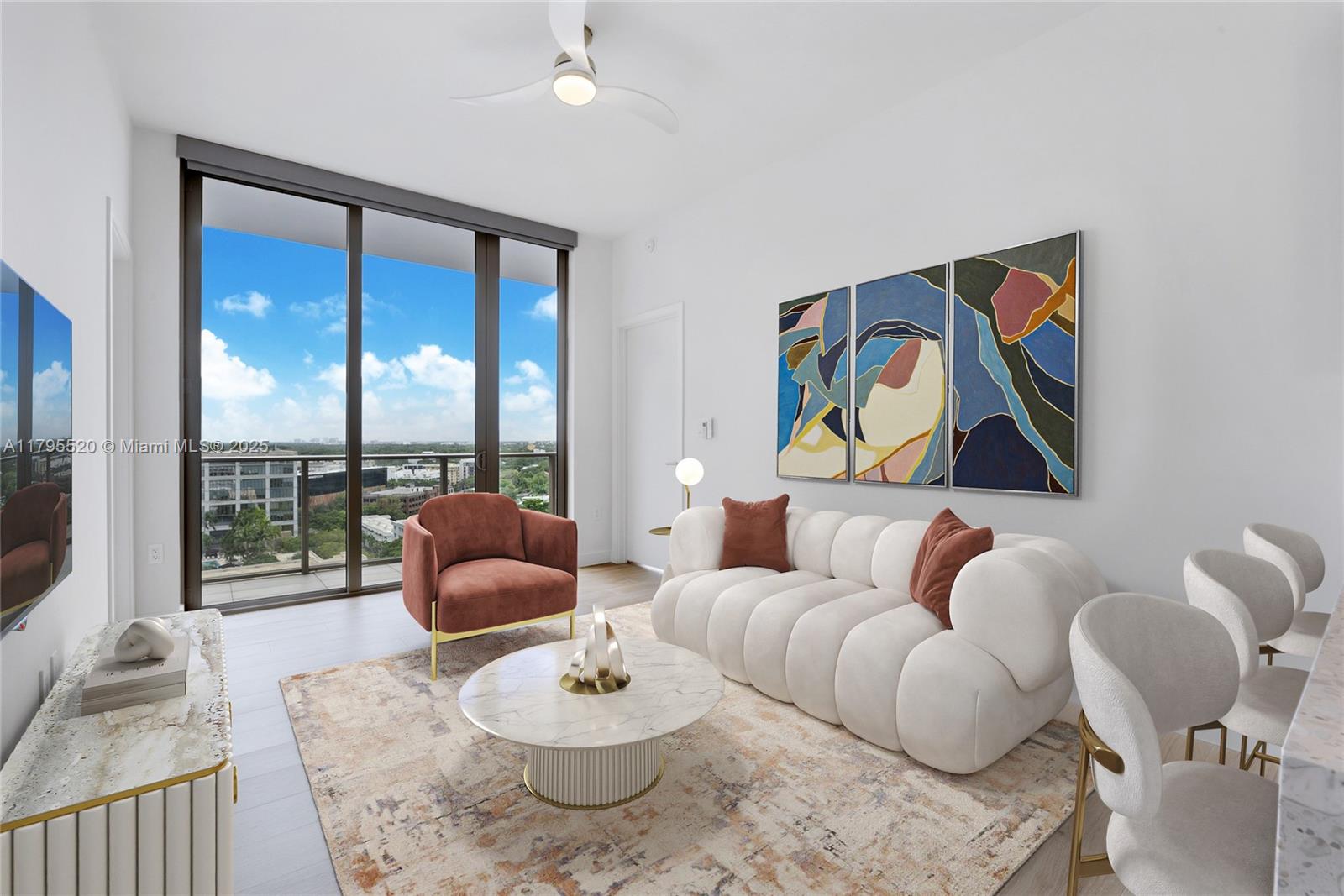A modern living room features a white channel-tufted sofa, marble coffee table, and floor-to-ceiling windows — 2678 Tigertail Ave # 1205, Miami FL 33133, MIAMI, FL