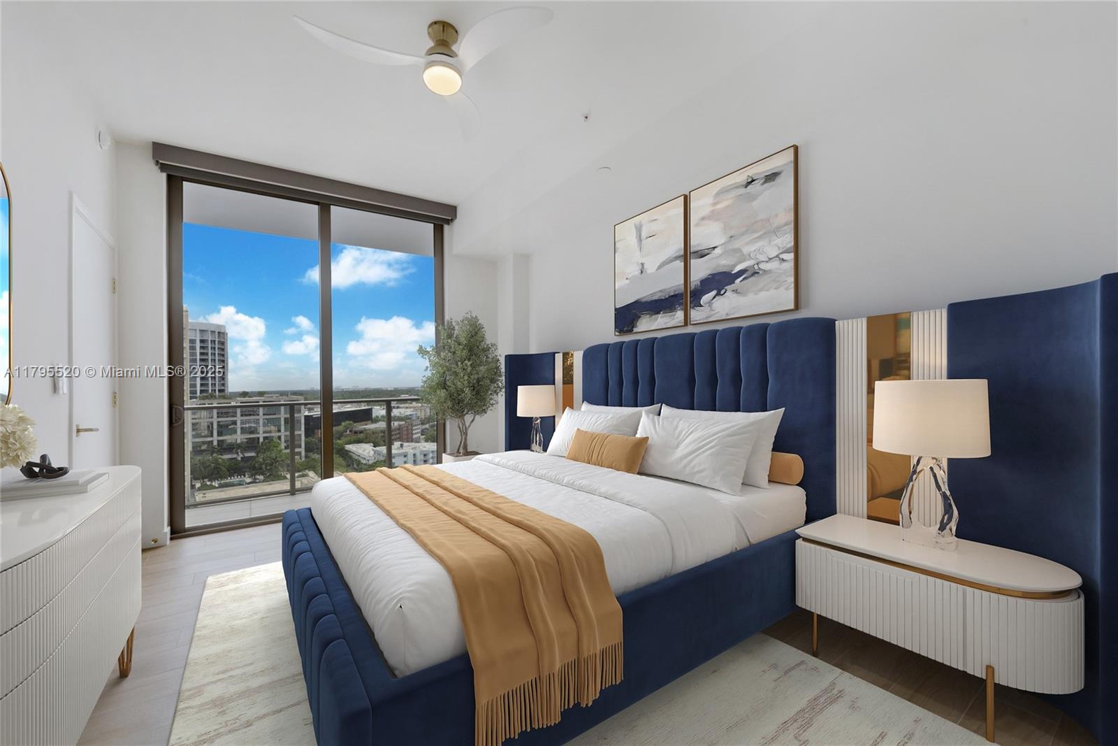 This bedroom features a blue tufted bed, white nightstands, and a balcony with city views — 2678 Tigertail Ave # 1205, Miami FL 33133, MIAMI, FL