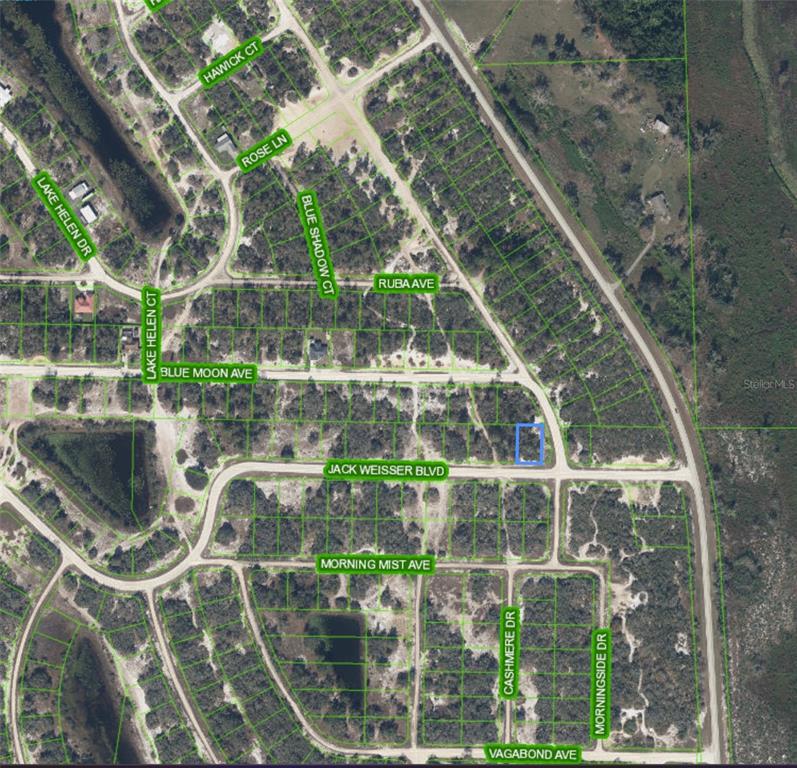 An aerial map view shows a highlighted vacant residential lot located at a street intersection — 472 JACK WEISSER BOULEVARD, LAKE PLACID, FL
