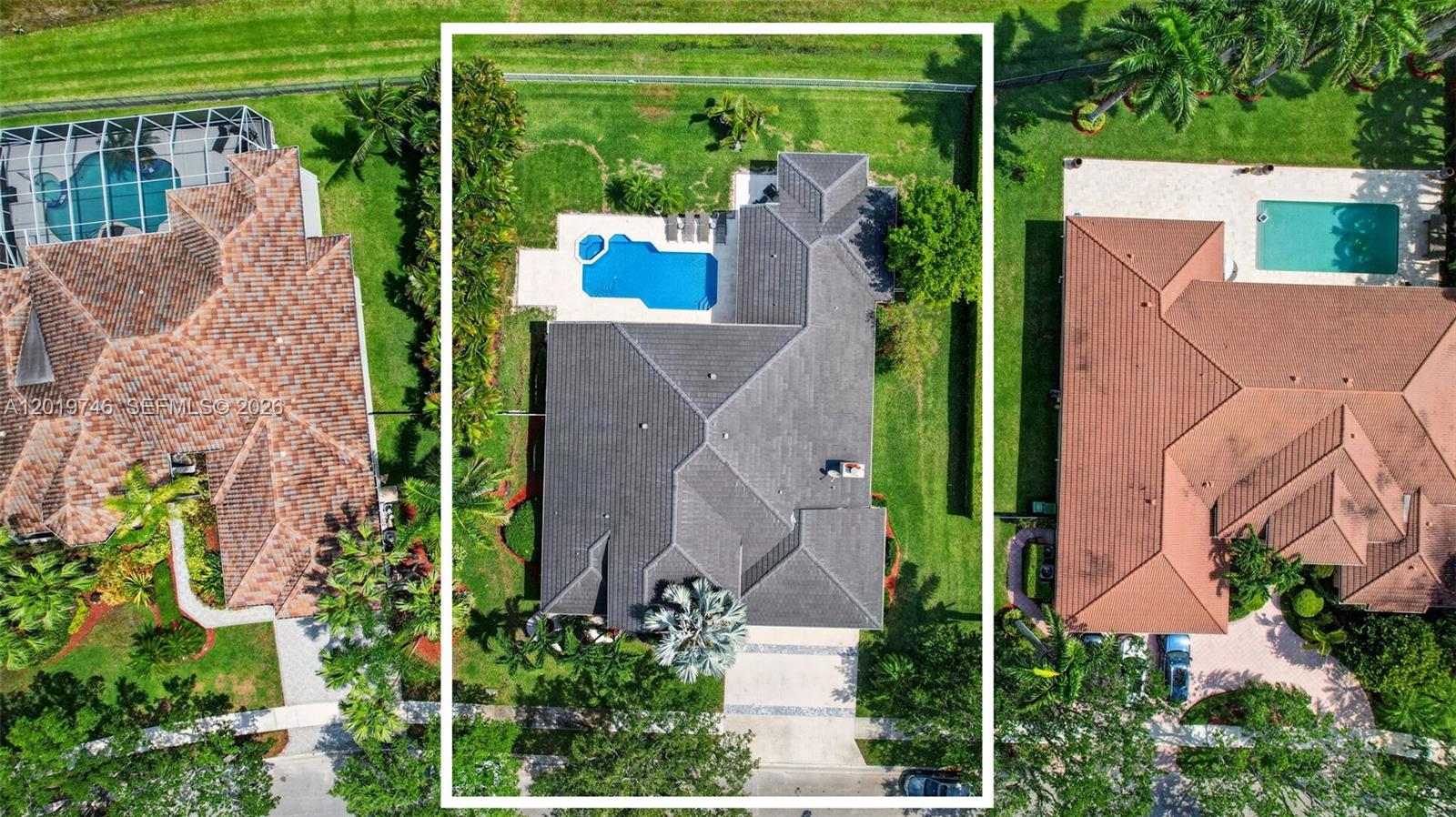 An aerial view shows a house with a dark roof, a pool, and a lawn — 2922 Medinah, Weston FL 33332, WESTON, FL