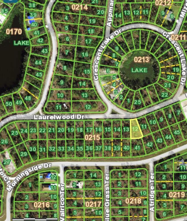 This is a satellite map view showing a highlighted vacant residential lot in a neighborhood — 28095 LAURELWOOD DRIVE, PUNTA GORDA, FL