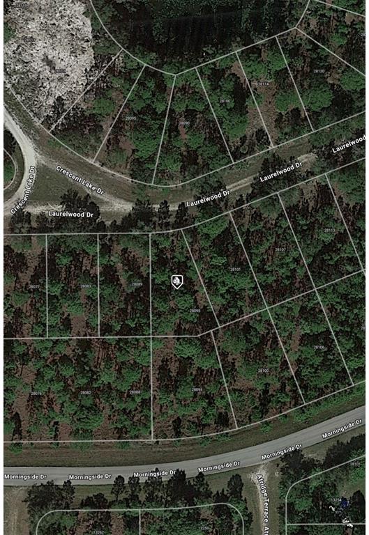 This is an aerial map view of a wooded residential lot between two curved roads — 28095 LAURELWOOD DRIVE, PUNTA GORDA, FL