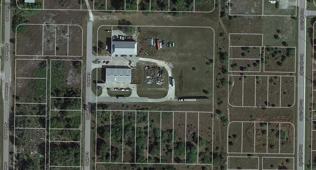 An aerial map view shows a commercial property with two buildings and a parking area — 27075 TUNNEY TERRACE, PUNTA GORDA, FL