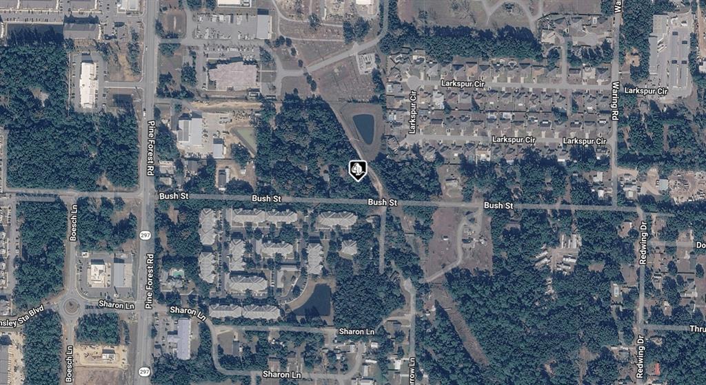 This is an aerial map view of a wooded area near residential streets and roads — 2200 BUSH STREET, PENSACOLA, FL