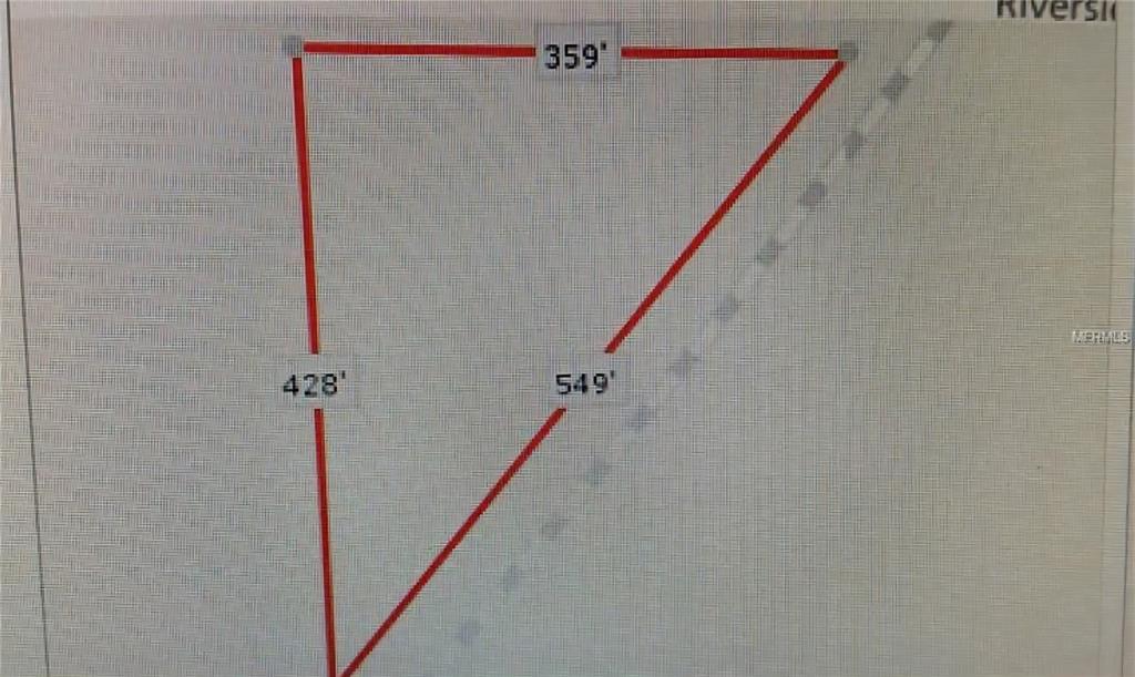 This is a map showing the triangular property lines and dimensions of a plot of land — 6721 RIVERSIDE DRIVE, PUNTA GORDA, FL