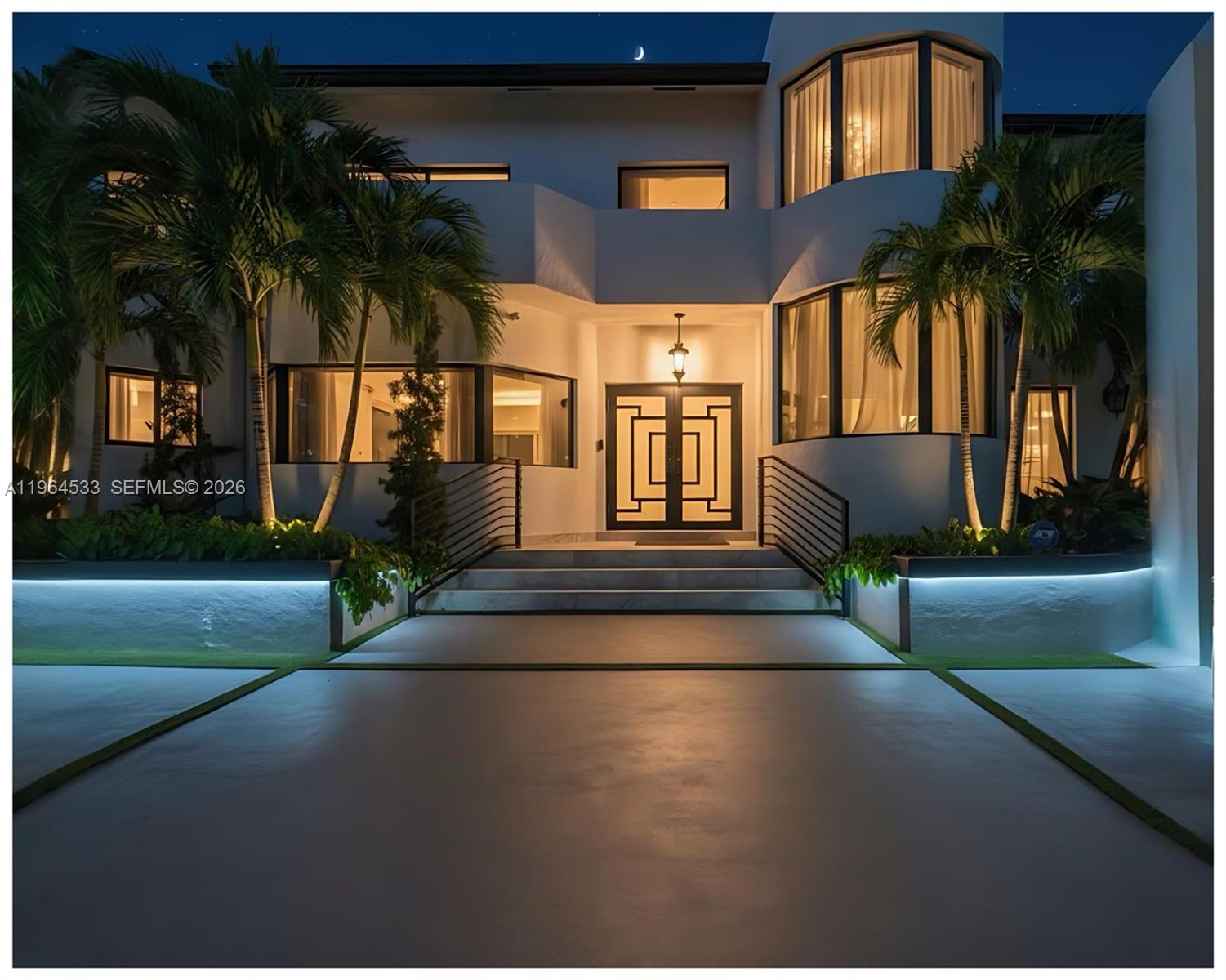 A swimming pool with a tiled spa sits in front of a covered patio and palm trees — 6180 Pine Tree Dr, Miami Beach FL 33140, MIAMI BEACH, FL