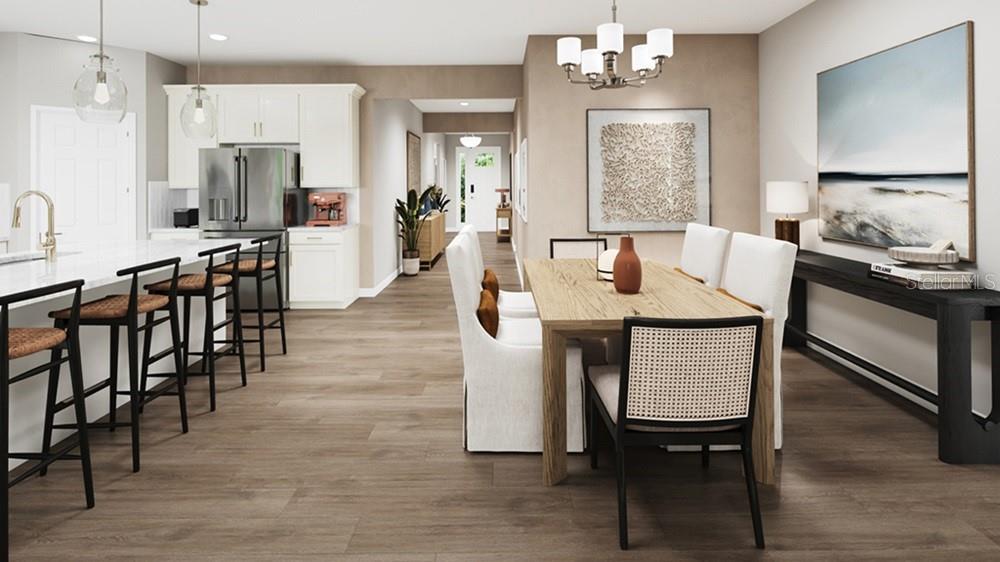 This rendering shows an open-concept kitchen and dining area with wood flooring and white cabinetry — 21 GEOSAM DRIVE, PALM COAST, FL