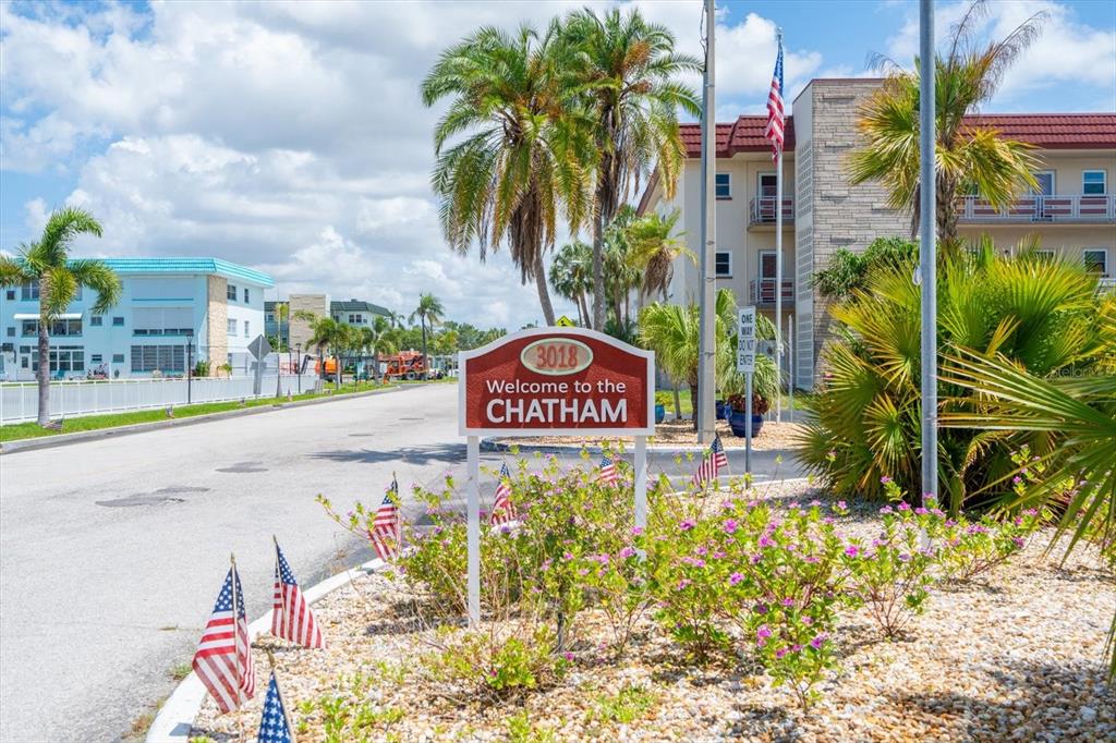 A sign reading Welcome to the Chatham stands in front of a multi-story apartment building — 3018 59TH STREET S UNIT 414, GULFPORT, FL