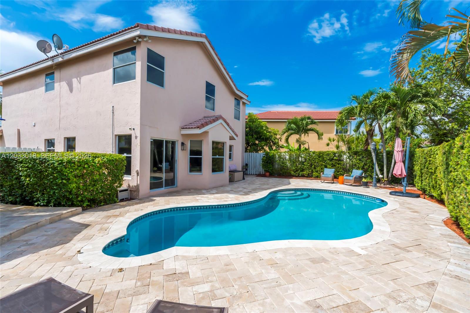 A two-story house with a backyard swimming pool and a paved patio area — 18172 SW 3rd St, Pembroke Pines FL 33029, PEMBROKE PINES, FL