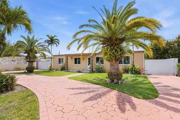 A single-story house with a stamped concrete driveway and several palm trees in the yard — 5000 SW 98th Ave Rd # 0, Miami FL 33165, MIAMI, FL