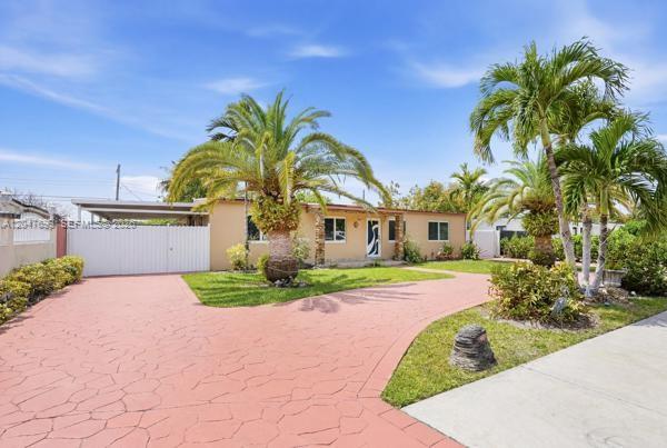 A single-story house with a stamped concrete driveway, palm trees, and a white fence — 5000 SW 98th Ave Rd # 0, Miami FL 33165, MIAMI, FL