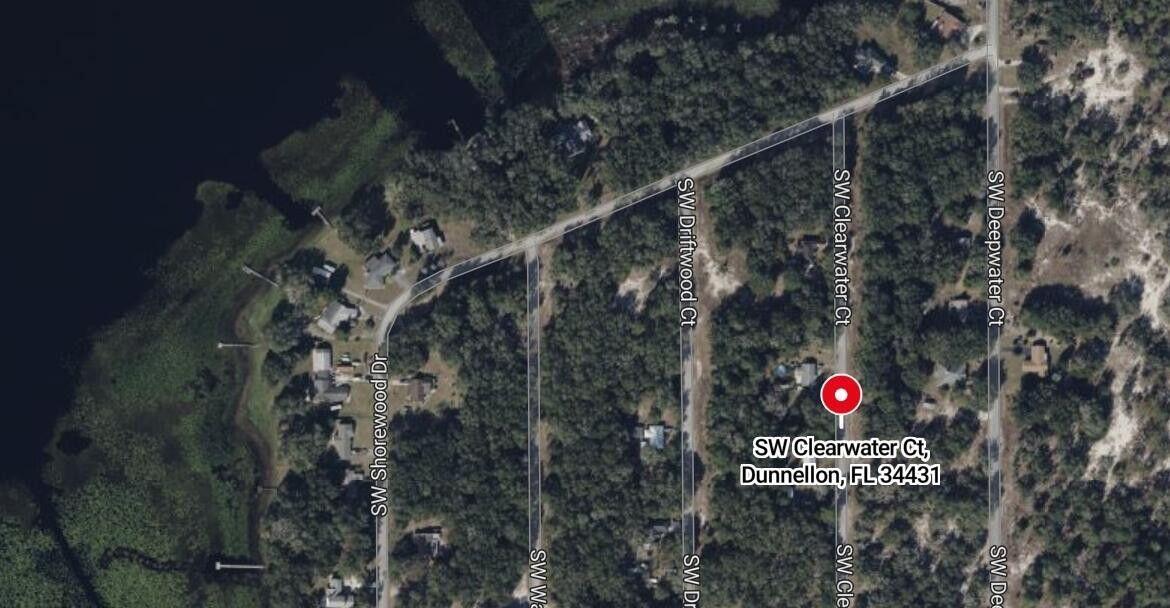 This is an aerial map view of a residential area with streets and wooded lots — 0 SW Clearwater Court, FL 34431, FL