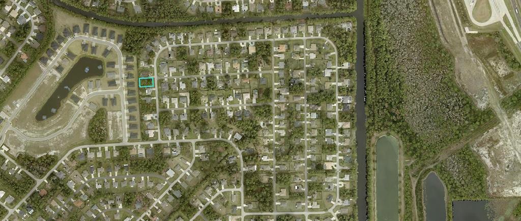 This aerial map shows a residential neighborhood with a highlighted vacant lot — 13 PORT ROYAL DRIVE, PALM COAST, FL