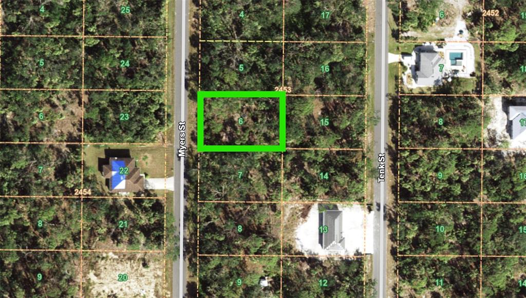 This is a satellite map showing a highlighted vacant residential lot between two paved streets — 328 MYERS STREET, PORT CHARLOTTE, FL