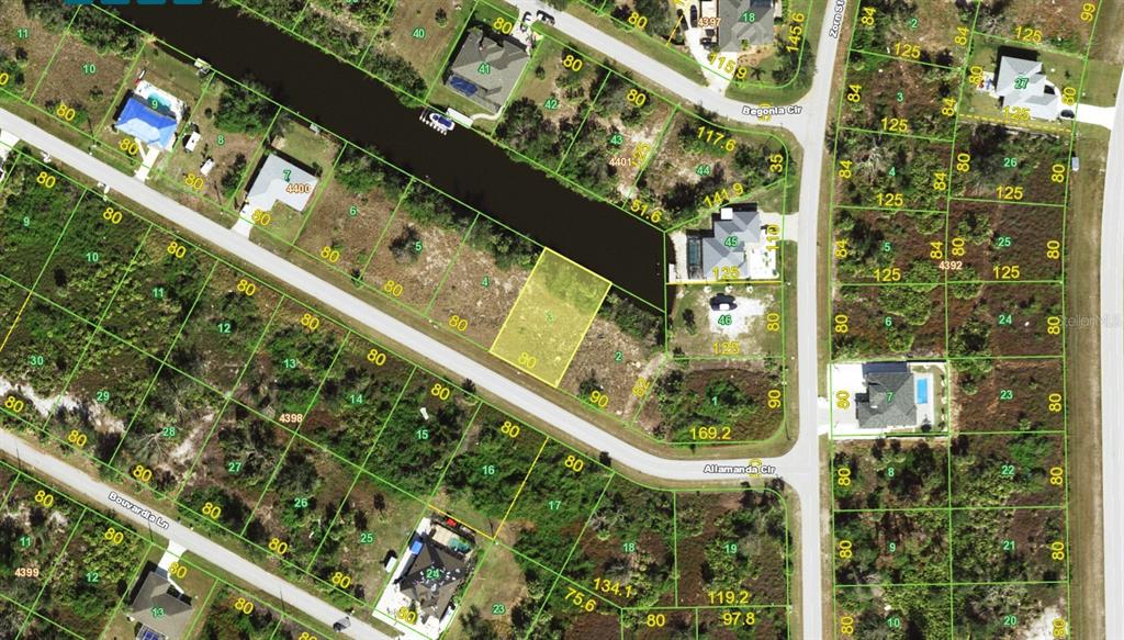 This is an aerial map showing residential lots and streets in a suburban neighborhood — 13574 ALLAMANDA CIRCLE, PORT CHARLOTTE, FL
