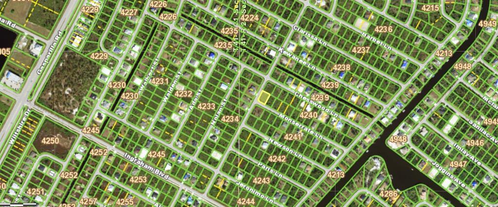 This is a satellite map view of a residential neighborhood with outlined property lots — 14024 MONSERRATE LANE, PORT CHARLOTTE, FL