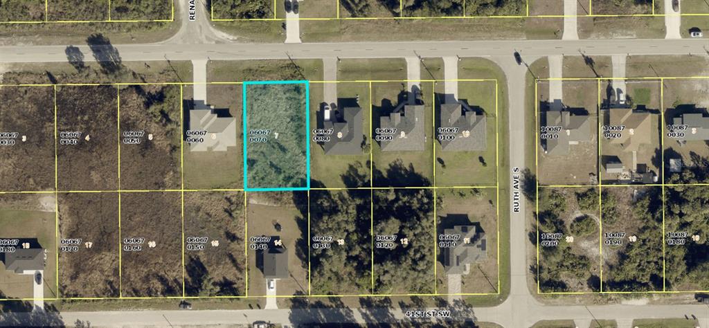 This is an aerial map showing a vacant residential lot highlighted in blue — 3217 40TH STREET SW, LEHIGH ACRES, FL