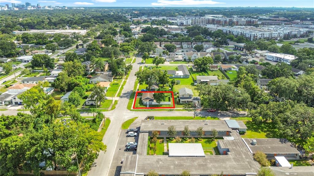 An aerial view shows a single-story house outlined in red within a suburban neighborhood — 1600 ROOSEVELT AVENUE, ORLANDO, FL
