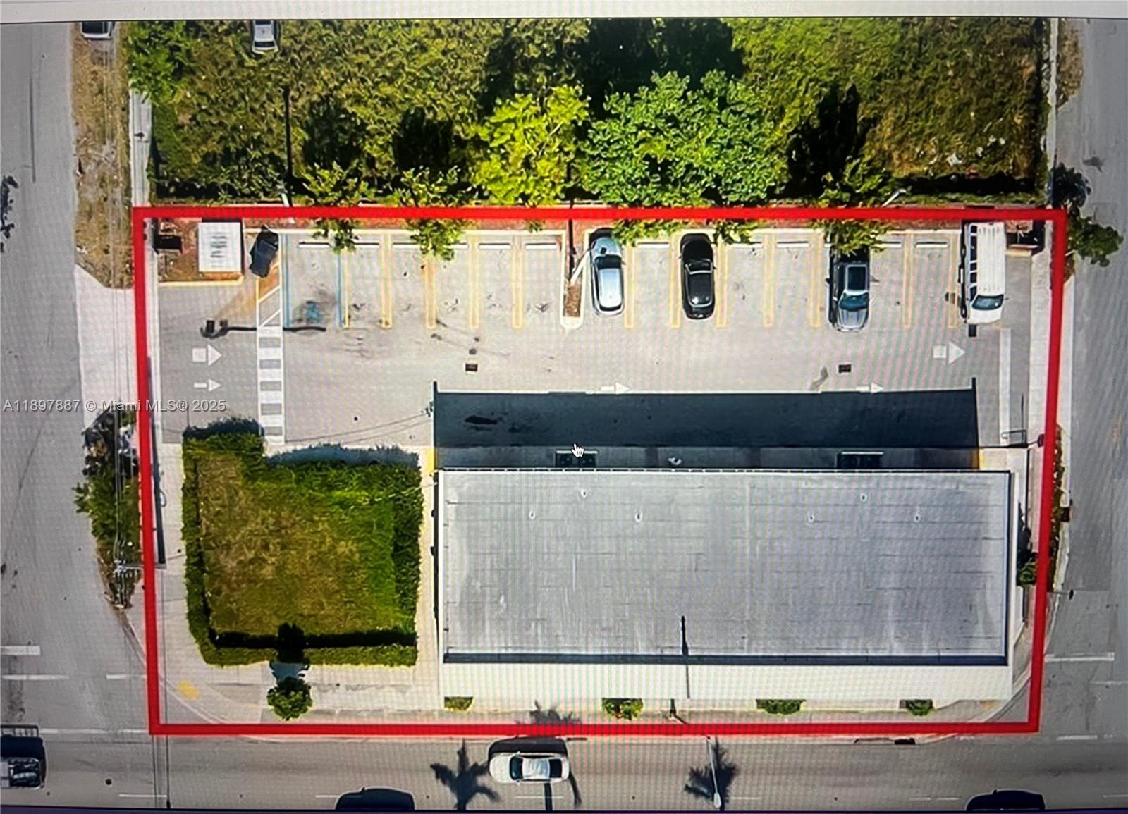 This is an aerial view of a commercial property with a building and parking lot — 9150 NW 22nd Ave, Miami FL 33147, MIAMI, FL