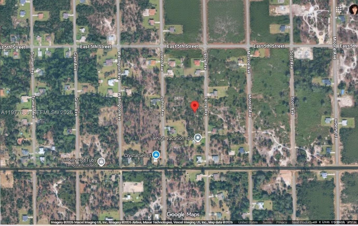 This is a satellite map view of a residential area with marked property locations — 411 LEROY AVE, Lehigh Acres FL 33972, LEHIGH ACRES, FL