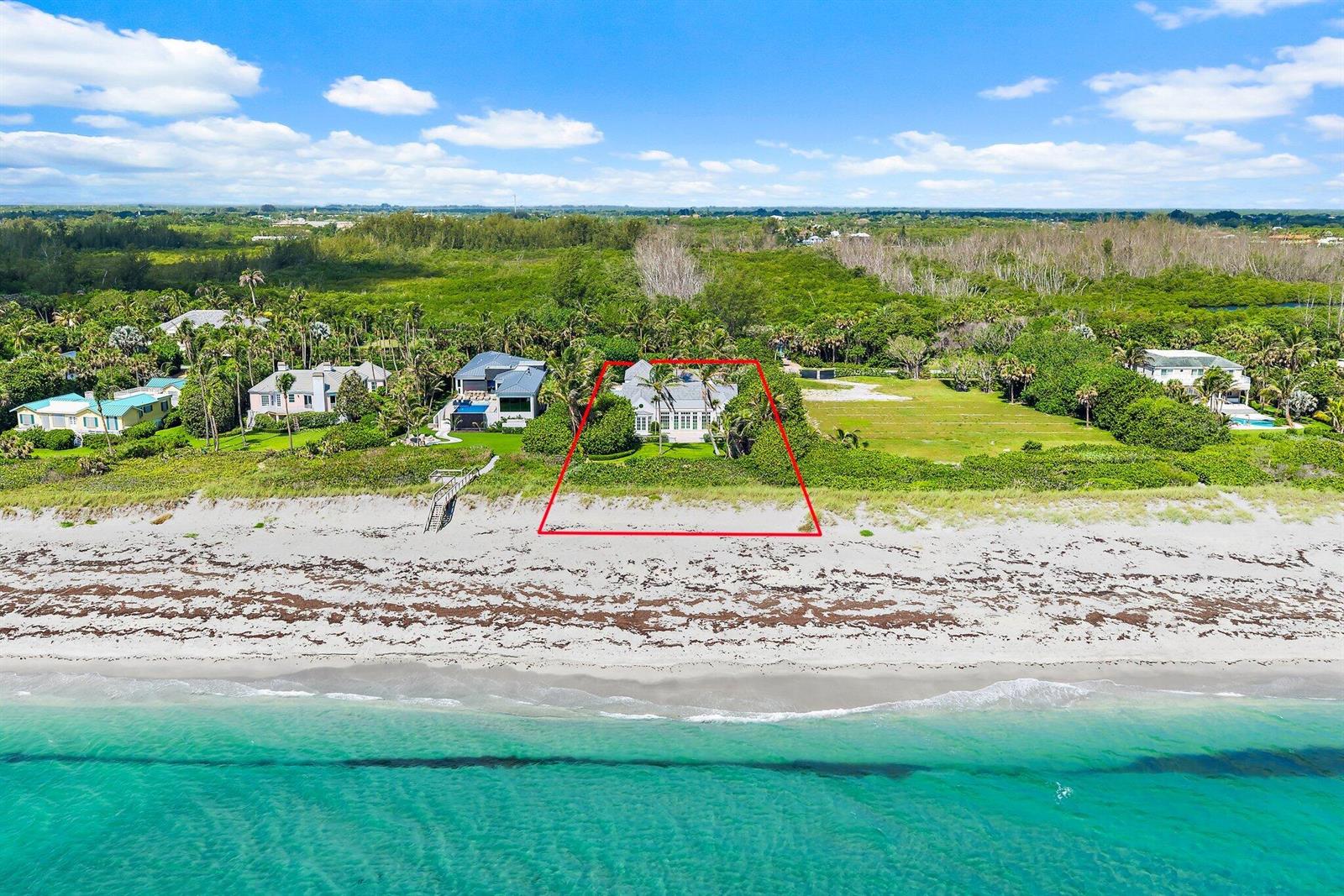 An aerial view shows a beachfront house outlined in red on a sandy coastline — 43 N Beach Road, Hobe Sound FL 33455, HOBE SOUND, FL