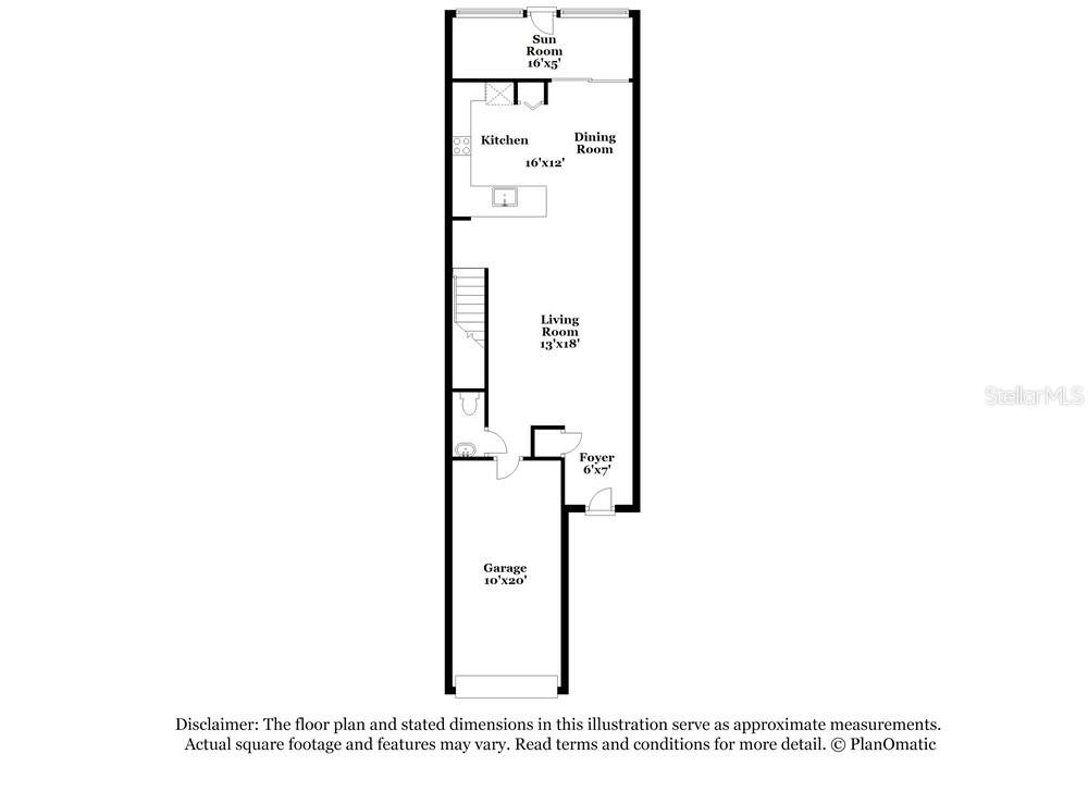 This is a floor plan showing a single-story home with a garage, kitchen, and sunroom — 2145 GREAT SAPPHIRE LANE, LUTZ, FL
