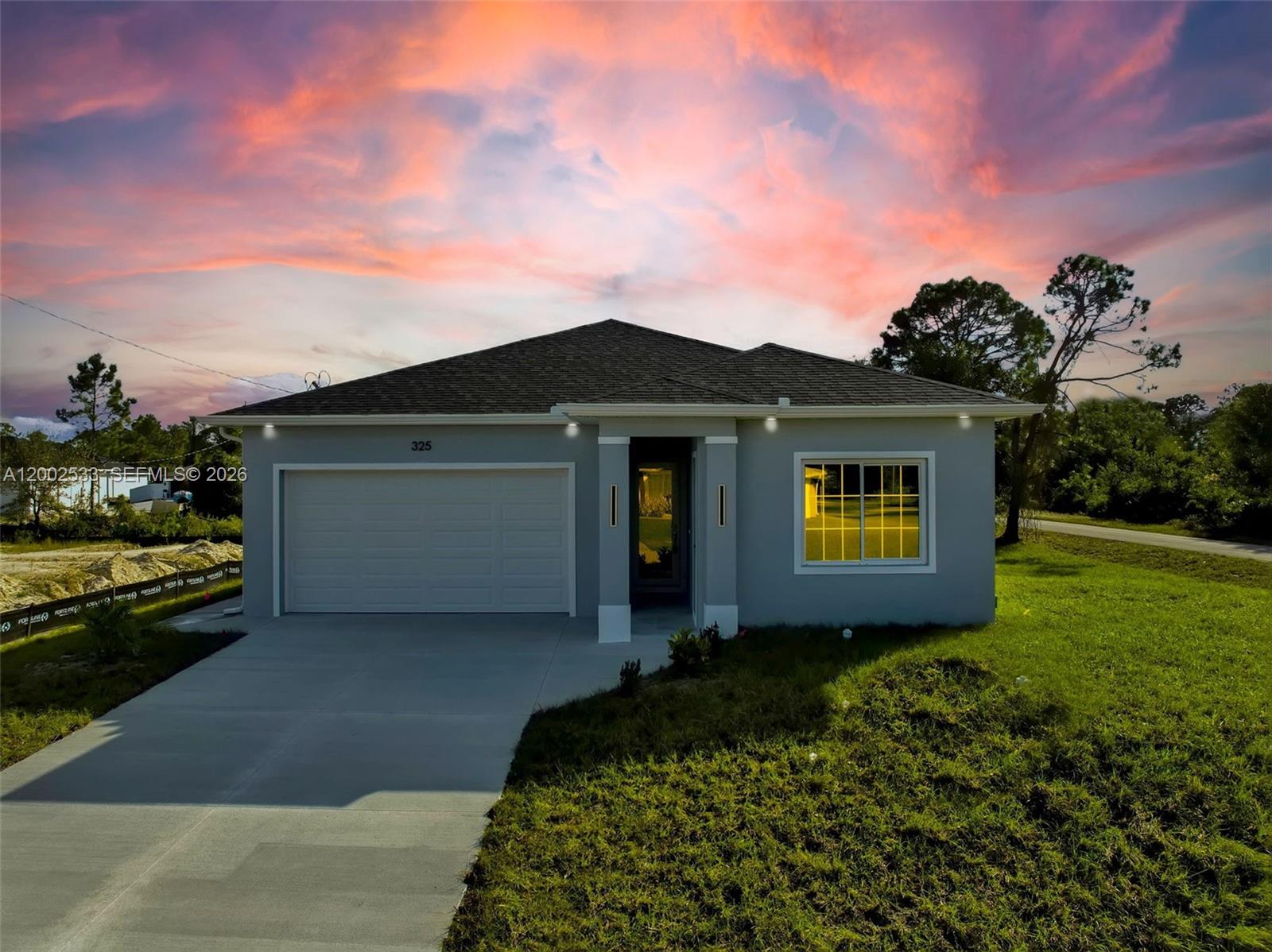 325 Lloyd AVE S, Lehigh Acres FL 33974