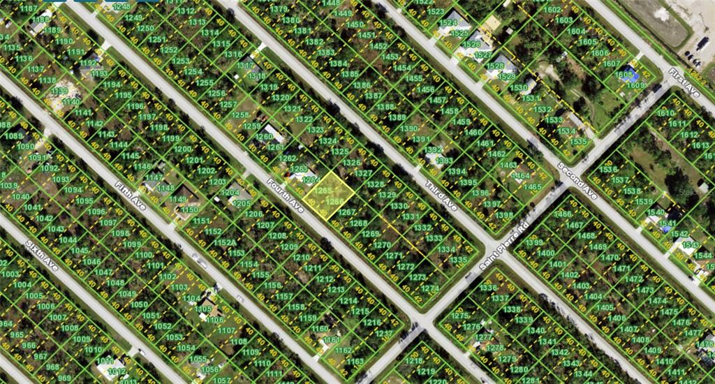 This is an aerial map showing a grid of residential lots and streets — 11452 4TH AVENUE, PUNTA GORDA, FL