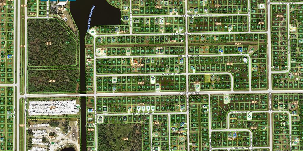 This is a satellite map view of a residential neighborhood with platted lots and streets — 13393 GALVESTON AVENUE, PORT CHARLOTTE, FL