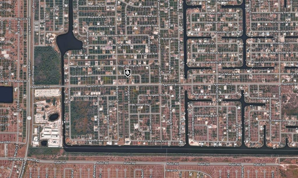This is an aerial map view of a residential neighborhood with streets and houses — 13393 GALVESTON AVENUE, PORT CHARLOTTE, FL