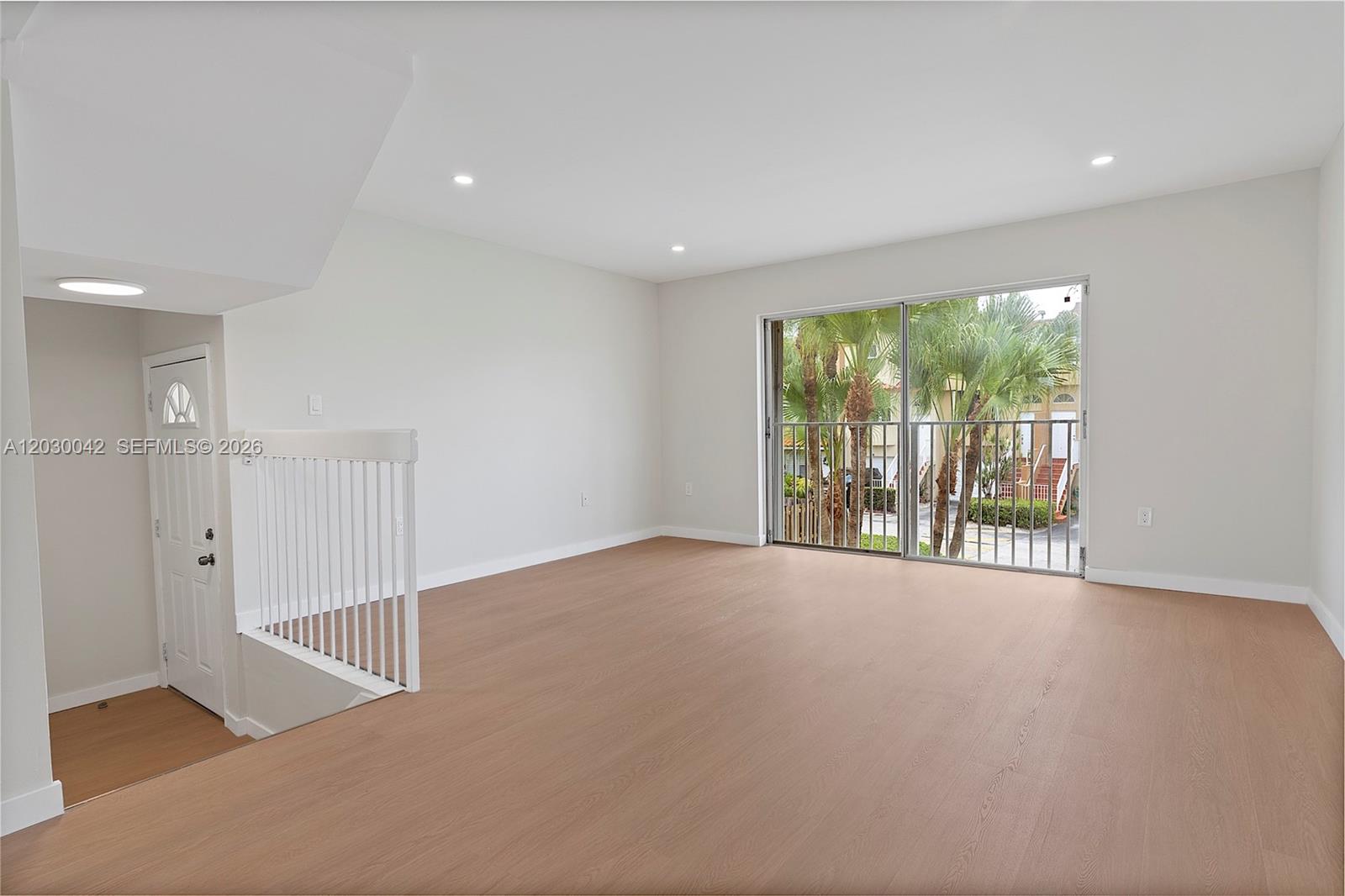 An aerial view of a townhouse with highlighted property boundaries and a private backyard area — 8631 NW 4th Ter # 1001, Miami FL 33126, MIAMI, FL
