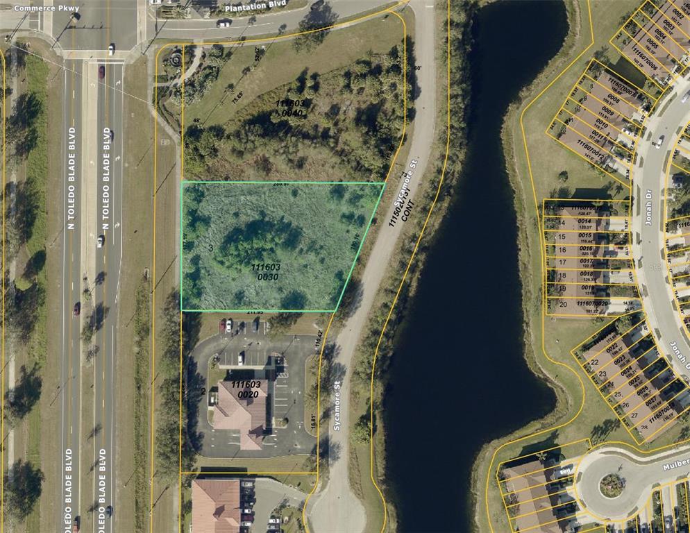 This is a map showing a vacant lot highlighted in green near a road — 2487 SYCAMORE STREET, NORTH PORT, FL
