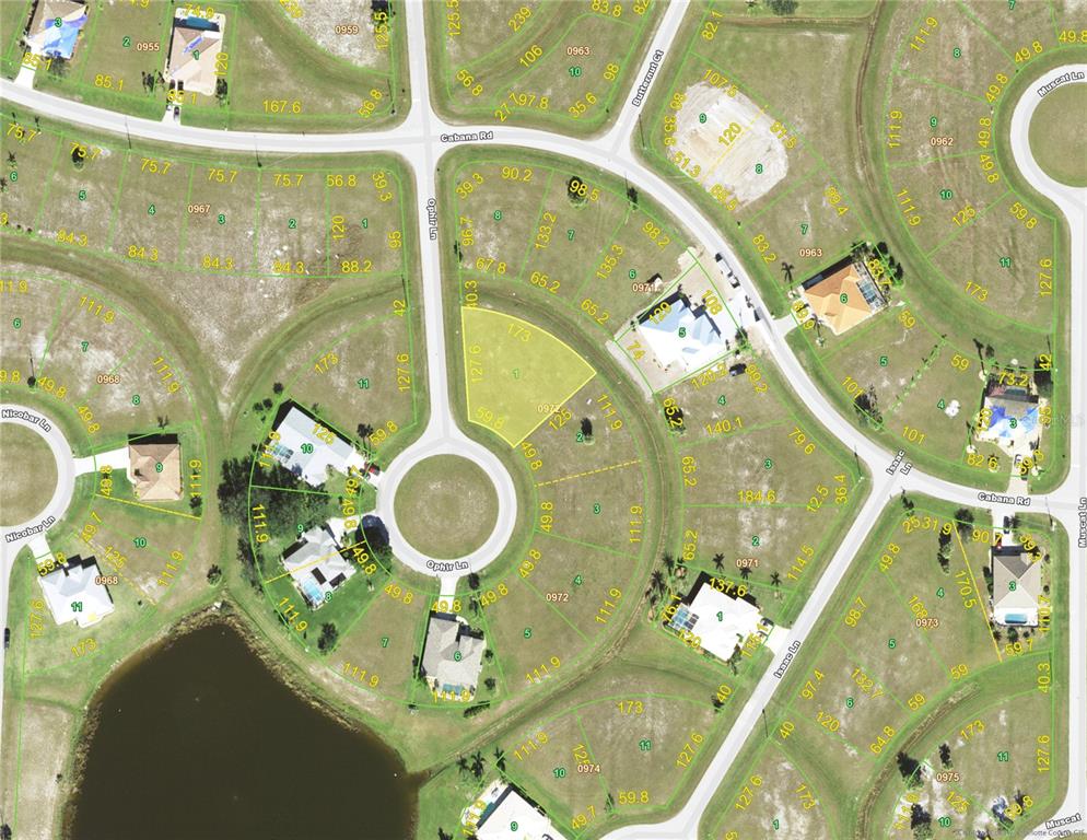 This is a satellite map showing residential lots, cul-de-sacs, and a small pond — 17336 OPHIR LANE, PUNTA GORDA, FL