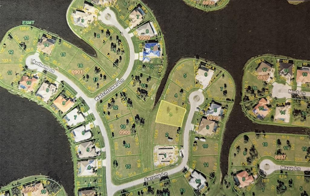 This is an aerial map showing residential lots and streets in a suburban neighborhood — 17157 SARONG LANE, PUNTA GORDA, FL