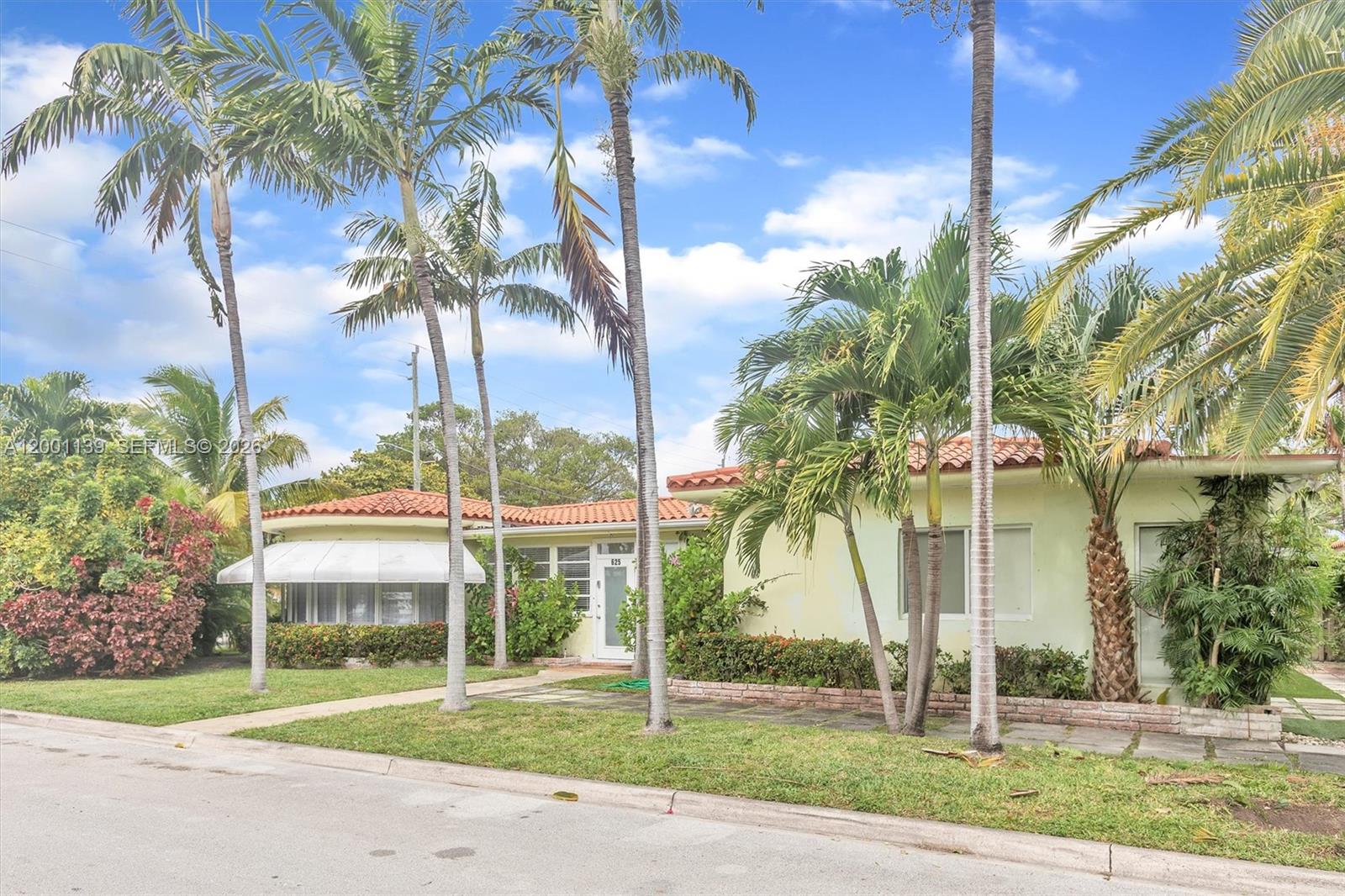 A single-story house with a red tile roof and palm trees in the front yard — 625 93rd St, Surfside FL 33154, SURFSIDE, FL