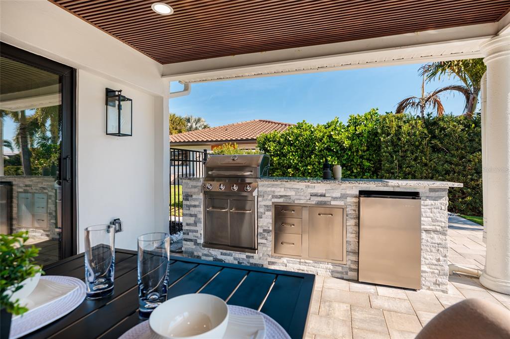 This is a floor plan of a single-story house featuring a pool and attached garage — 2032 KANSAS AVENUE NE, ST PETERSBURG, FL