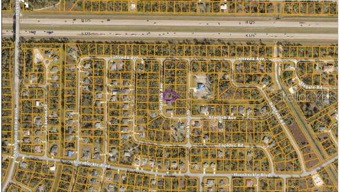 This is an aerial map view of a residential neighborhood with a highlighted property lot — STARFISH AVENUE, NORTH PORT, FL