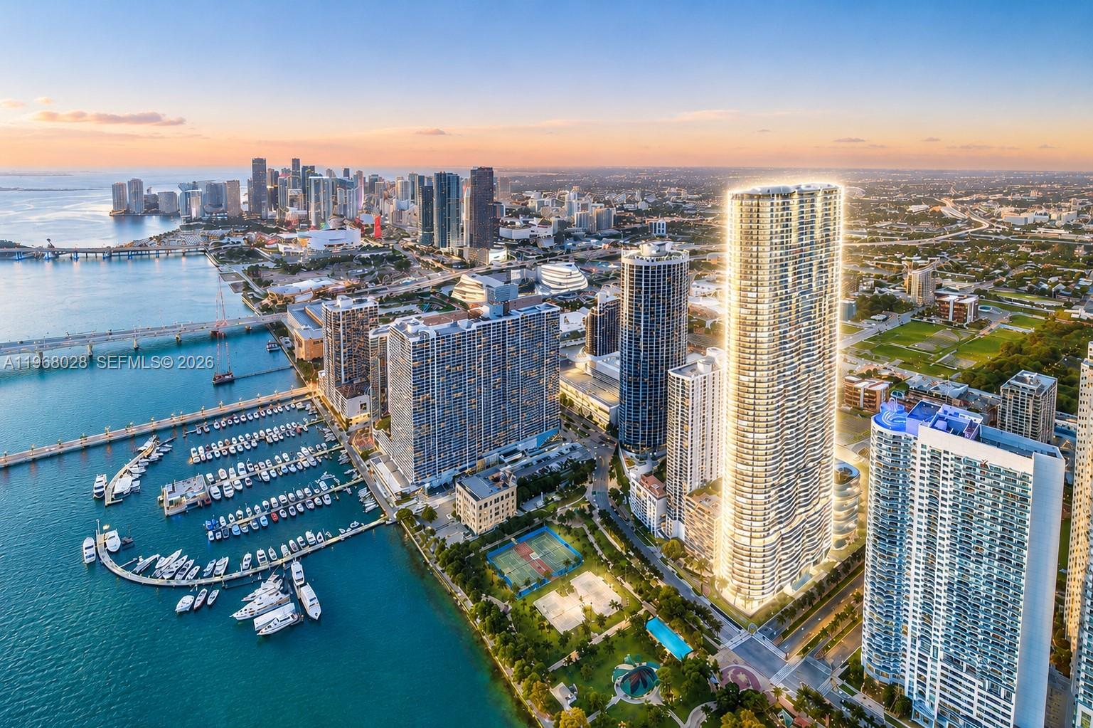 A modern open-concept living and dining area with floor-to-ceiling windows and marble flooring — 488 NE 18th St # 2001, Miami FL 33132, MIAMI, FL