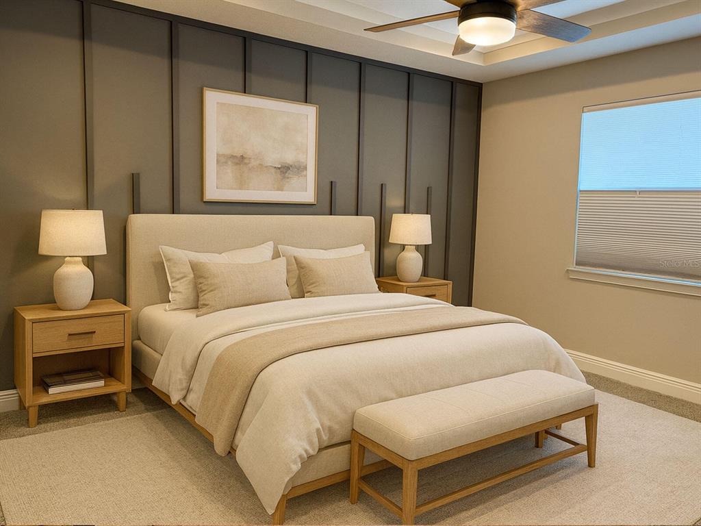 A bedroom features a beige upholstered bed, light wood nightstands, and a dark paneled accent wall — 31969 ASBURY AVENUE, WESLEY CHAPEL, FL