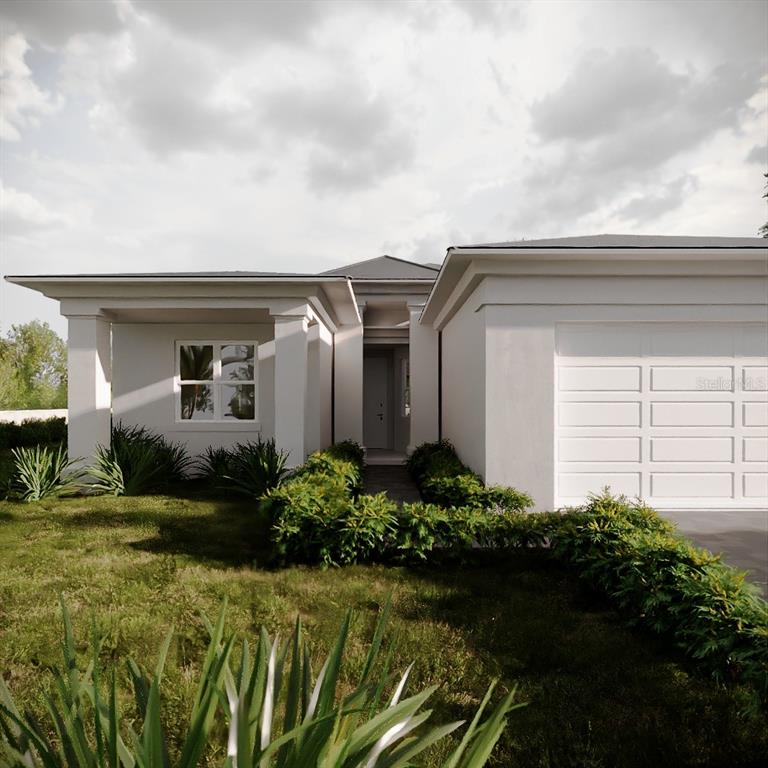 This is a rendering of the exterior of a modern, single-story house with a garage — 1428 MAILE STREET, NORTH PORT, FL