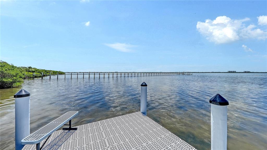 A view from a dock looking out over a calm body of water — 180 HORSESHOE LOOP ROAD, TERRA CEIA, FL