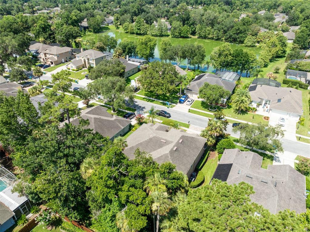 This image is a two-story floor plan showing the layout of a residential home — 525 SADDLEWOOD LANE, WINTER SPRINGS, FL