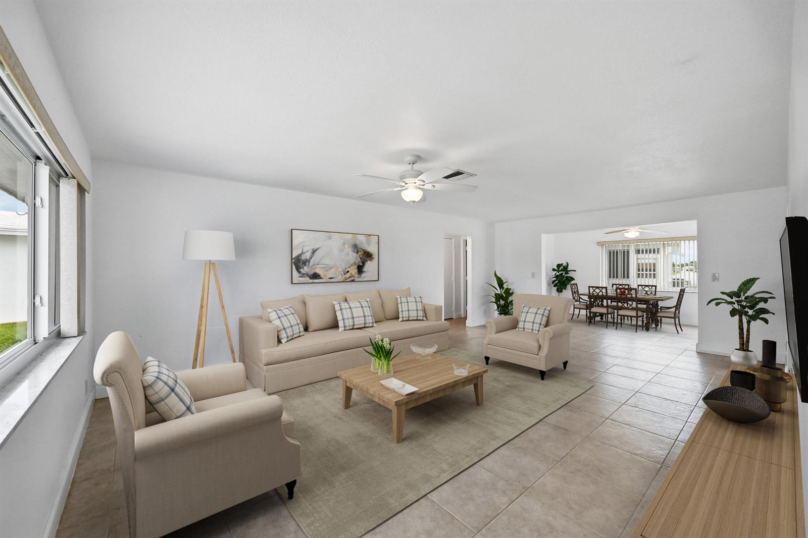 A living room with beige furniture, a wooden coffee table, and tile flooring — 1316 SW 23rd Street, Boynton Beach FL 33426, BOYNTON BEACH, FL