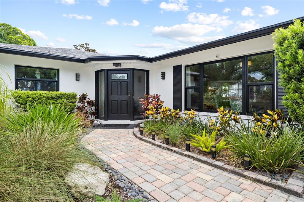 This is a floor plan of a single-story house with three bedrooms and a garage — 14006 81ST AVENUE, SEMINOLE, FL
